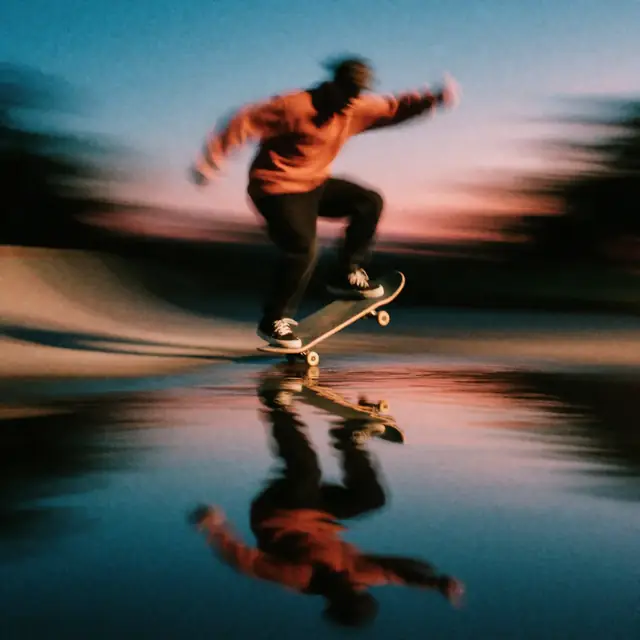 Krea 2 ComfyUI: A skateboarder’s kickflip mirrored in a puddle